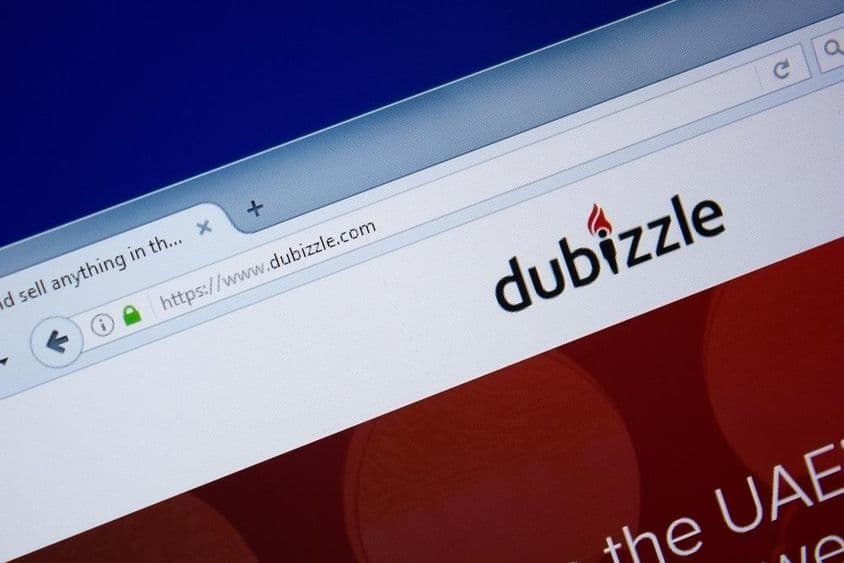 Dubizzle网站首页在电脑显示器上的展示,网址 - Dubizzle.com。