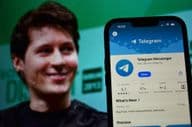 Telegram背景中可见的首席执行官帕维尔·杜罗夫。